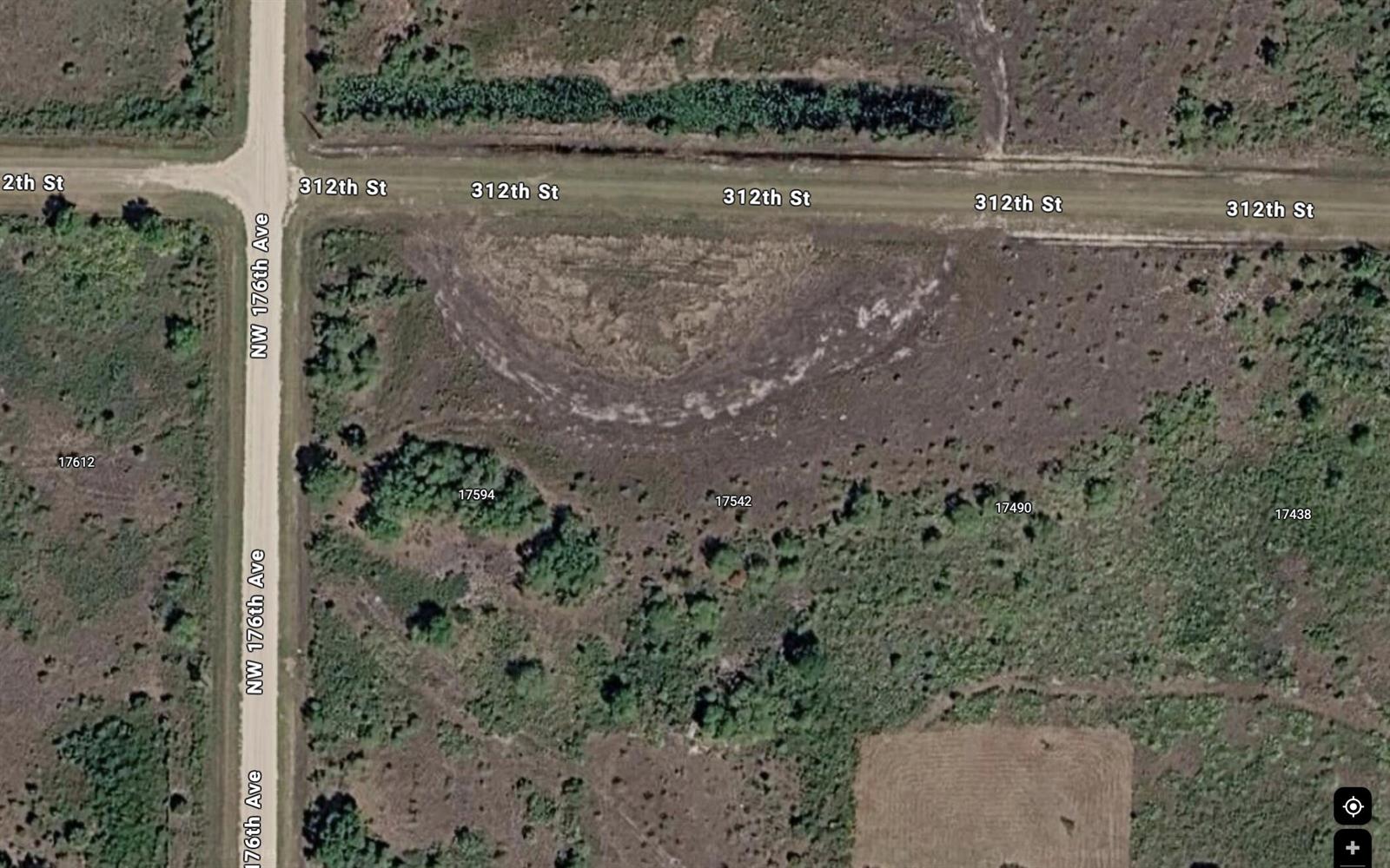 This aerial map view shows a rural intersection with undeveloped land and dirt roads — 17594 NW 312th Street, Okeechobee FL 34972, OKEECHOBEE, FL