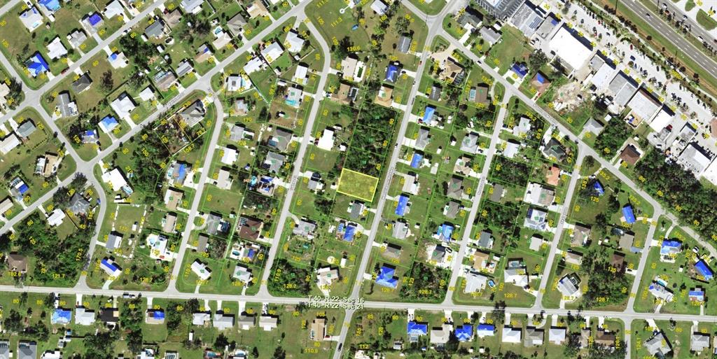 This is an aerial map view of a residential neighborhood highlighting a specific vacant lot — 646 W TARPON BOULEVARD NW, PORT CHARLOTTE, FL