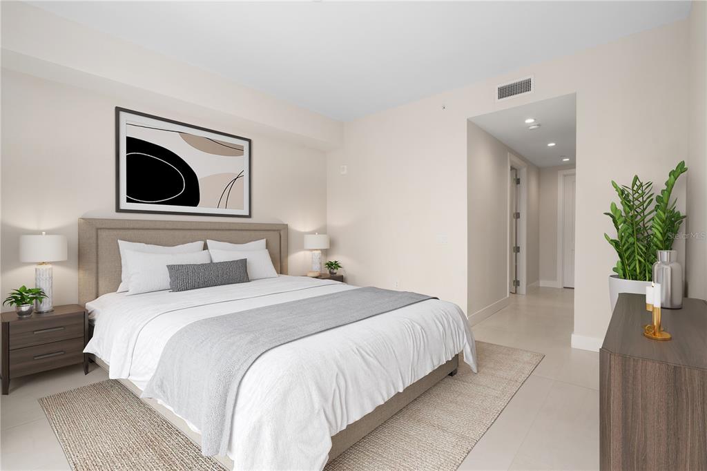 A modern bedroom features a king bed, two nightstands, and a hallway leading away — 275 1ST AVENUE S UNIT 1902, ST PETERSBURG, FL