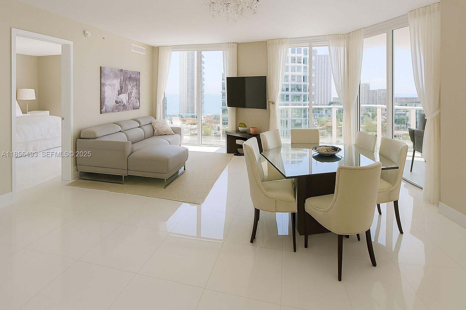 A modern living and dining area features white tile floors, floor-to-ceiling windows, and city views — 250 Sunny Isles Blvd # 1506, Sunny Isles Beach FL 33160, SUNNY ISLES BEACH, FL
