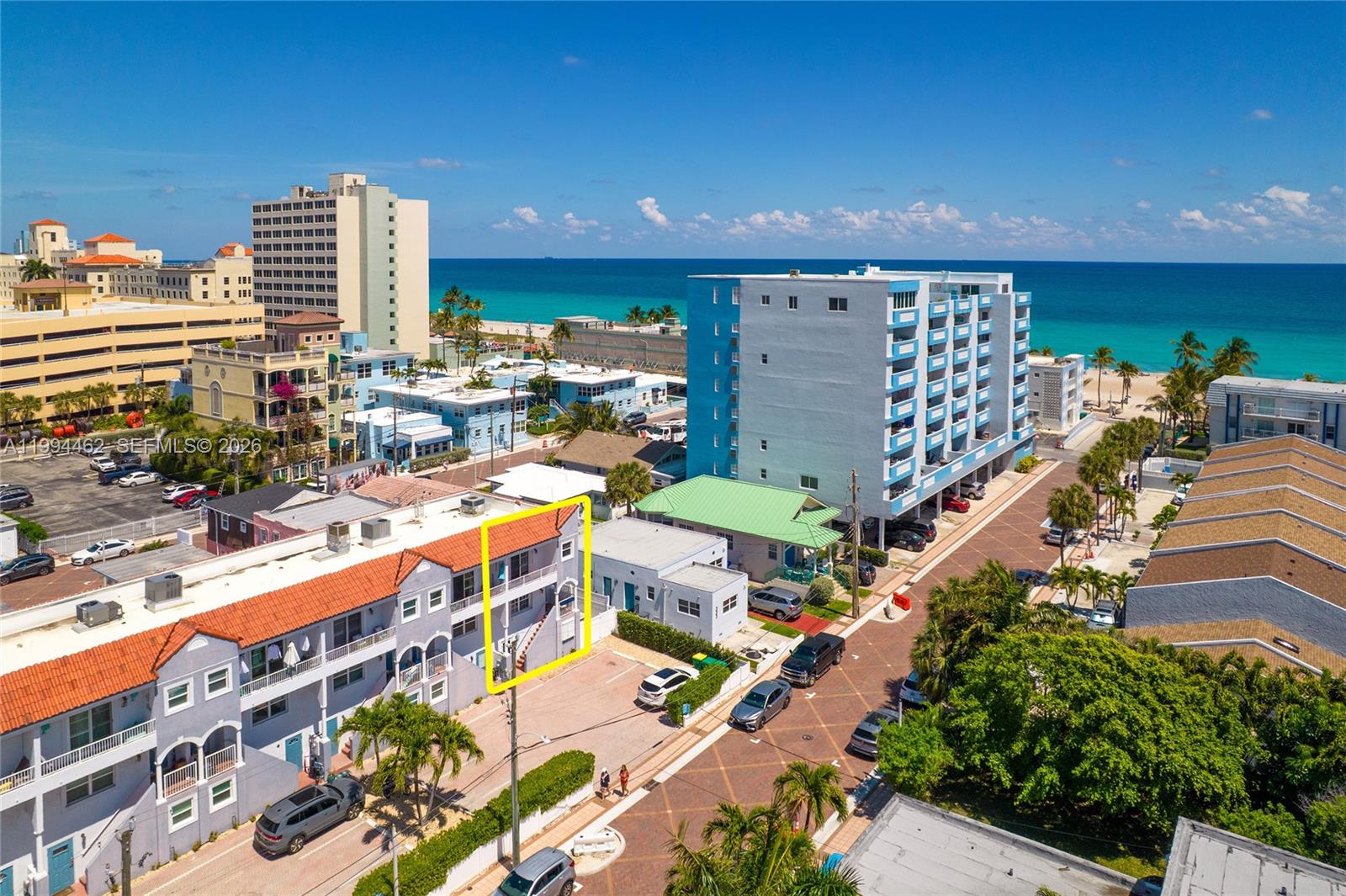 An aerial view shows a multi-story residential building with a highlighted section near a street — 335 Virginia St, Hollywood FL 33019, HOLLYWOOD, FL