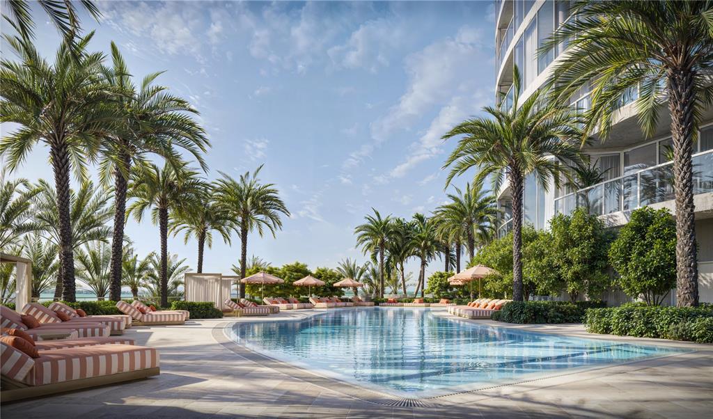 This architectural rendering shows a swimming pool surrounded by lounge chairs, palm trees, and landscaping — 805 S GULFVIEW BOULEVARD UNIT 603A, CLEARWATER BEACH, FL