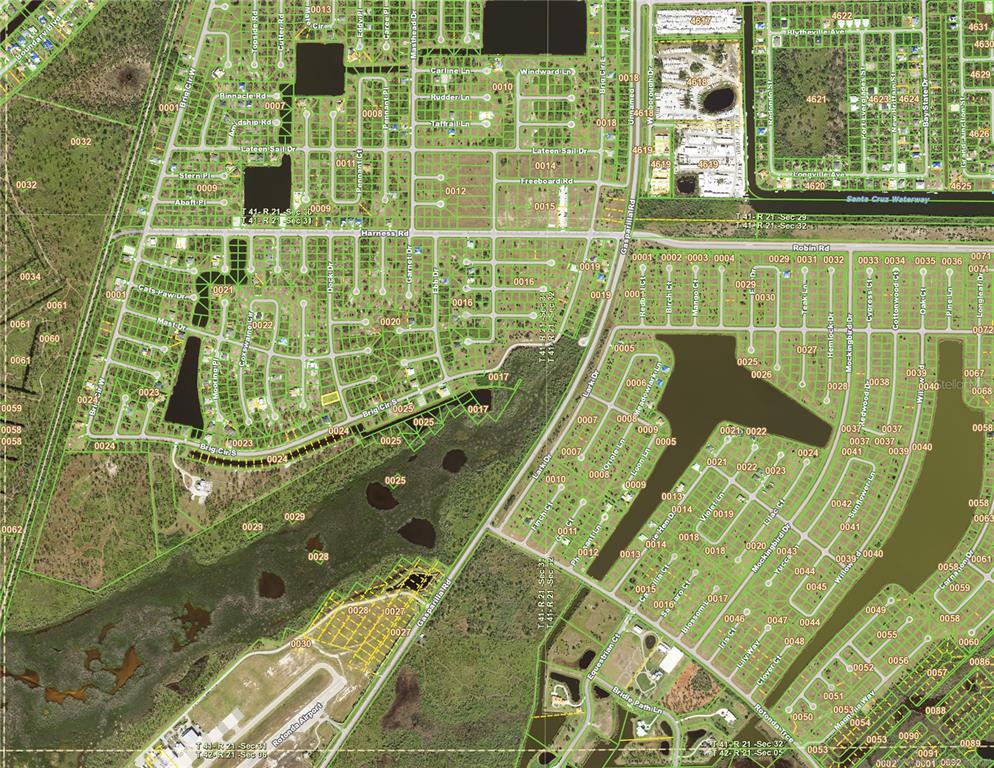 This is an aerial map showing a residential neighborhood with streets, lots, and waterways — 8 DOCK DRIVE, PLACIDA, FL