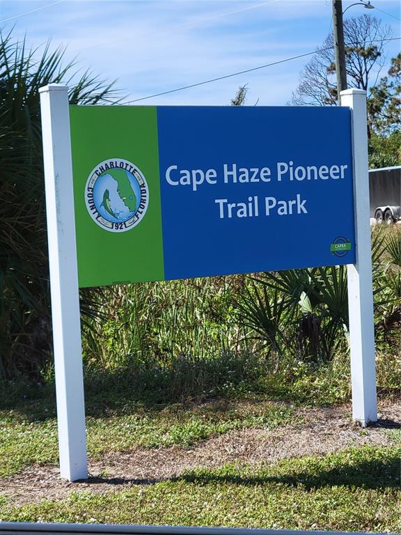 A sign for Cape Haze Pioneer Trail Park stands outdoors in a grassy area — 8 DOCK DRIVE, PLACIDA, FL