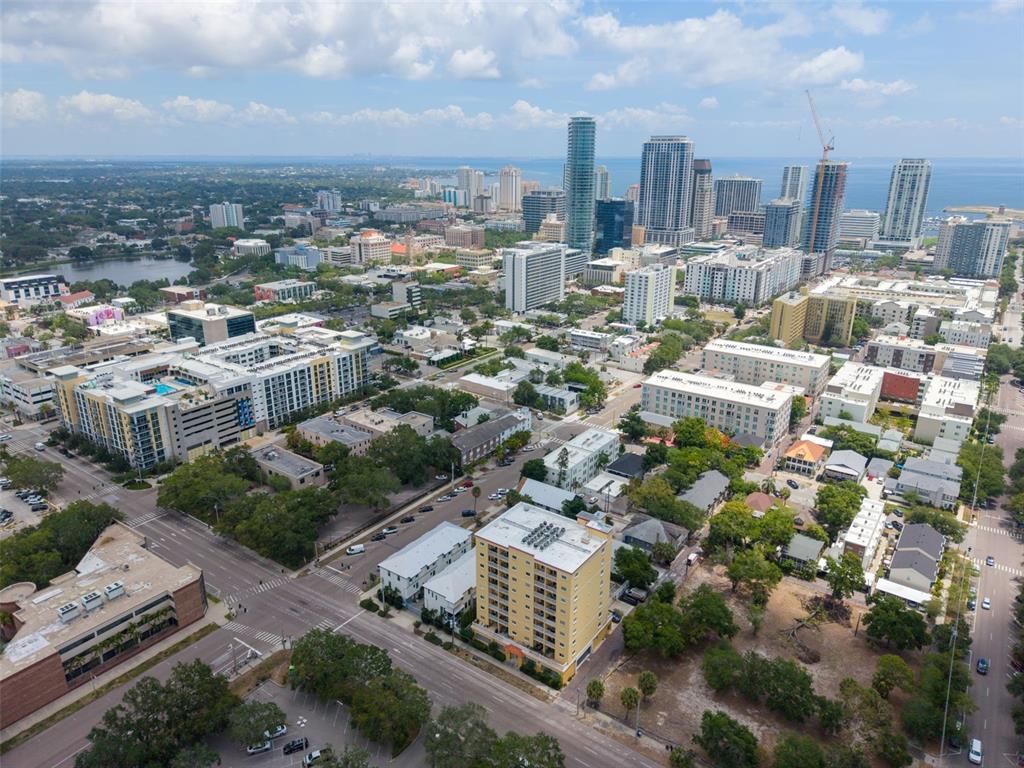 An aerial view of a city skyline with numerous high-rise buildings and surrounding residential areas — 316 8TH STREET S UNIT 604, ST PETERSBURG, FL