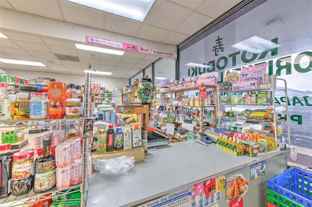 The interior of a small retail store features shelves stocked with various Asian food products — 5537 SHELDON ROAD UNIT V, TAMPA, FL