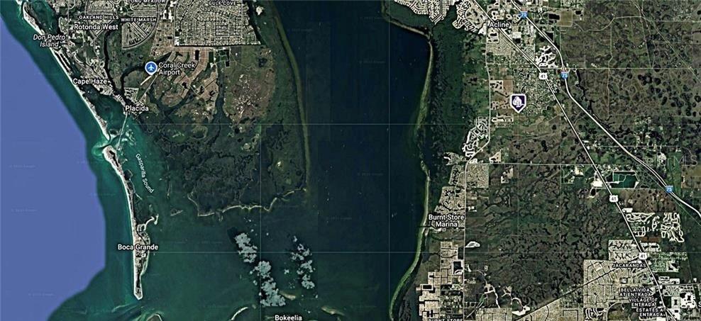 This is a satellite map view of the coastal area surrounding Charlotte Harbor, Florida — 27102 CHULA VISTA DRIVE, PUNTA GORDA, FL