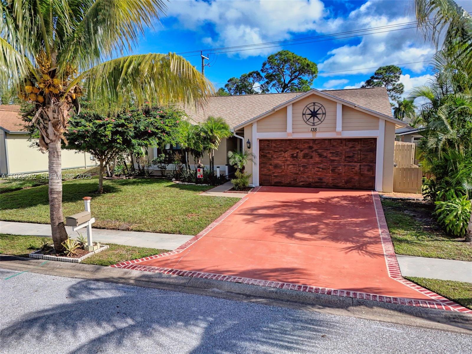 135 Rosewood Cir, Jupiter FL 33458