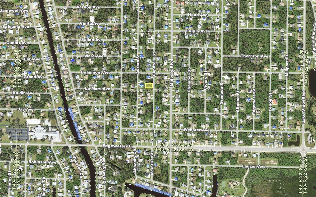 This is an aerial map showing a residential neighborhood with a highlighted vacant lot — 168 CAPATOLA STREET, PORT CHARLOTTE, FL