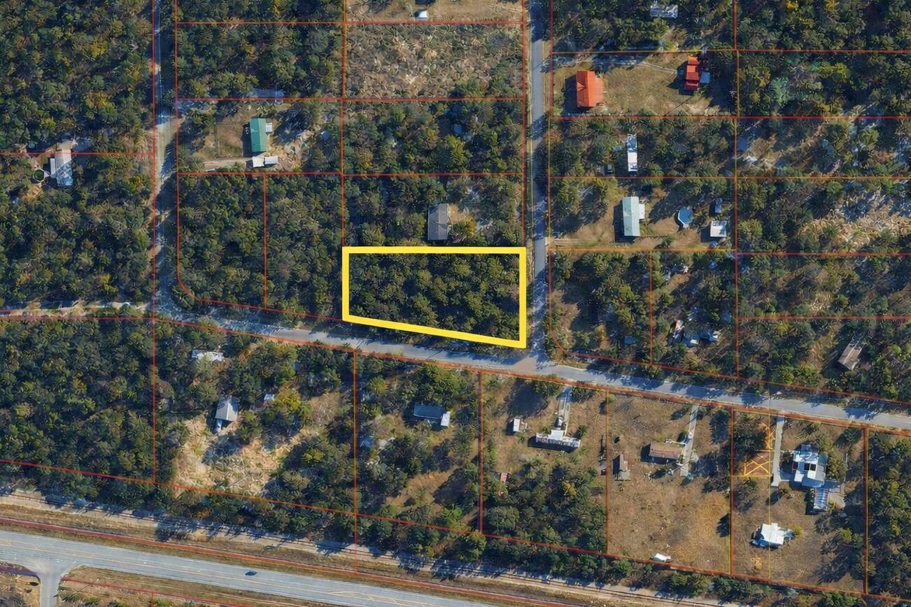 An aerial map view shows a rectangular plot of land highlighted in yellow among trees — 4375 SW 194th Avenue, FL 34432, FL