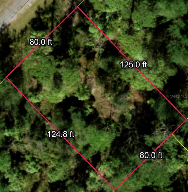 This is an aerial map showing the rectangular property boundaries and dimensions of a wooded lot — LOT 15, BIGNAY ROAD, NORTH PORT, FL