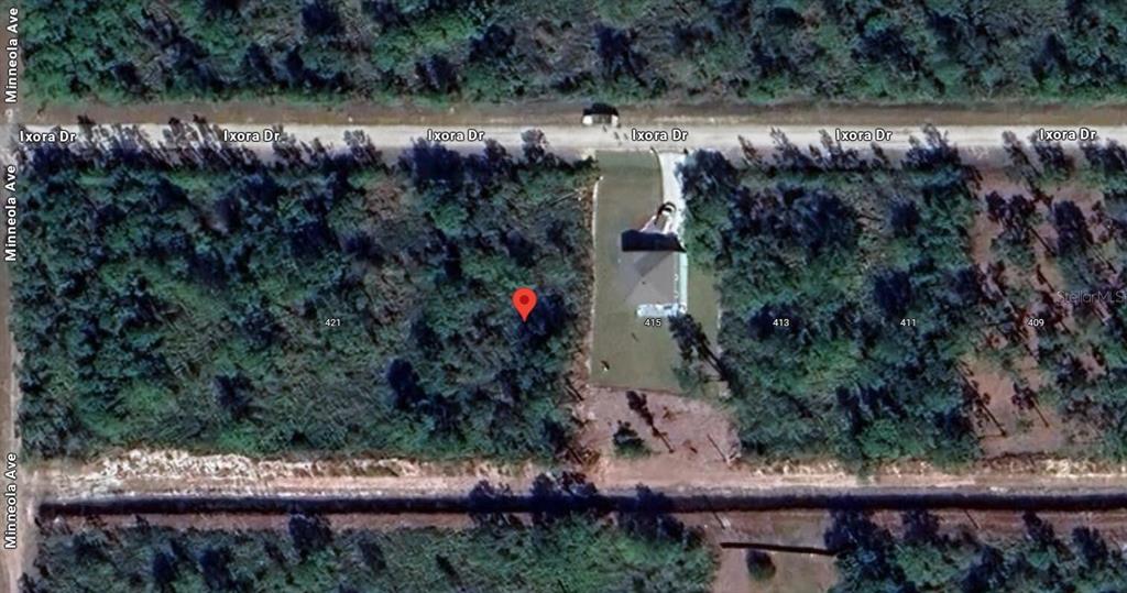 This is an aerial map view showing a residential lot with a red location pin — 417 AZALEA DRIVE, INDIAN LAKE ESTATES, FL