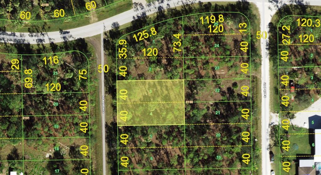 This is a satellite map view showing multiple rectangular land parcels with lot dimensions — 13036 CRINOLINE DRIVE, PUNTA GORDA, FL