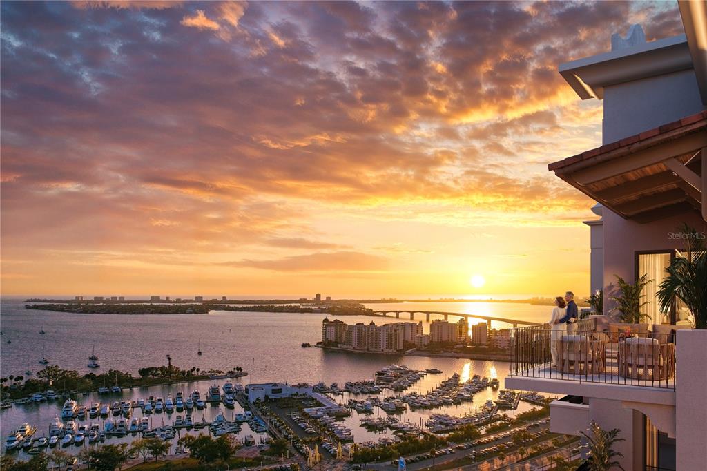 This rendering shows a high-rise balcony overlooking a marina and bay at sunset — 65 S PALM AVENUE UNIT 702, SARASOTA, FL