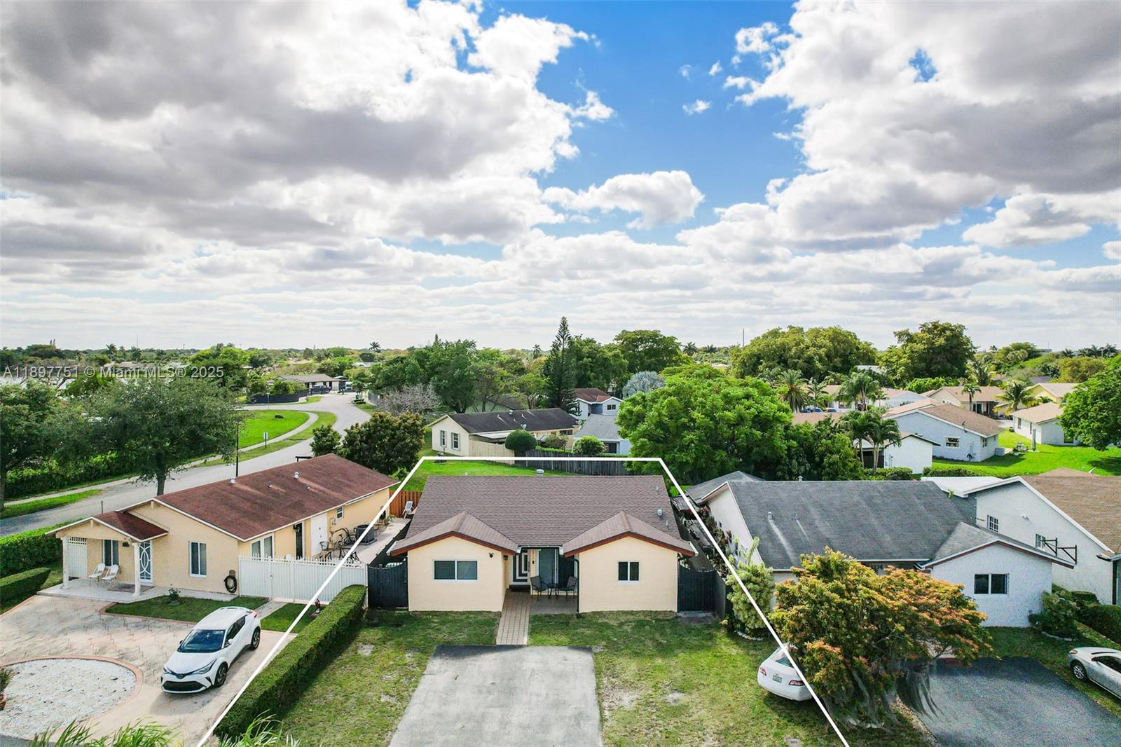 An aerial view shows a single-story house with a brown roof and a concrete driveway — 4216 SW 138th Ct, Miami FL 33175, MIAMI, FL