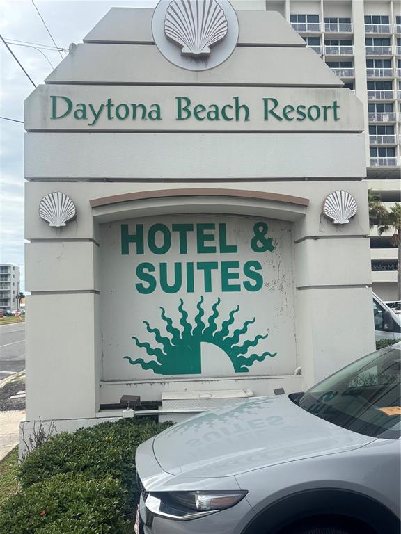 A sign for the Daytona Beach Resort Hotel & Suites stands in front of a building — 2700 N ATLANTIC AVENUE UNIT 415, DAYTONA BEACH, FL