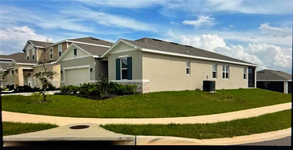 This floor plan shows a single-story house layout with four bedrooms, a garage, and patio — 5442 CATMINT DRIVE, HAINES CITY, FL