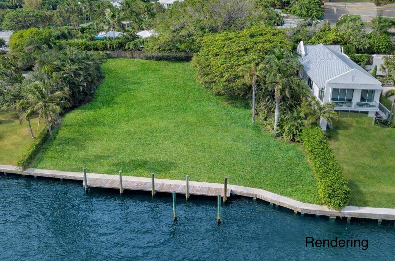 An aerial view shows a vacant waterfront lot with a wooden dock and adjacent house rendering — 1 Fisher Lane, Delray Beach FL 33483, DELRAY BEACH, FL
