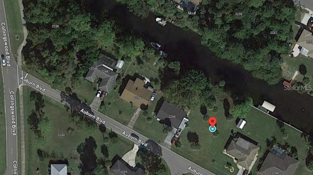 This is an aerial map view of a residential property and surrounding neighborhood — 2272 AUBURN BOULEVARD, PORT CHARLOTTE, FL