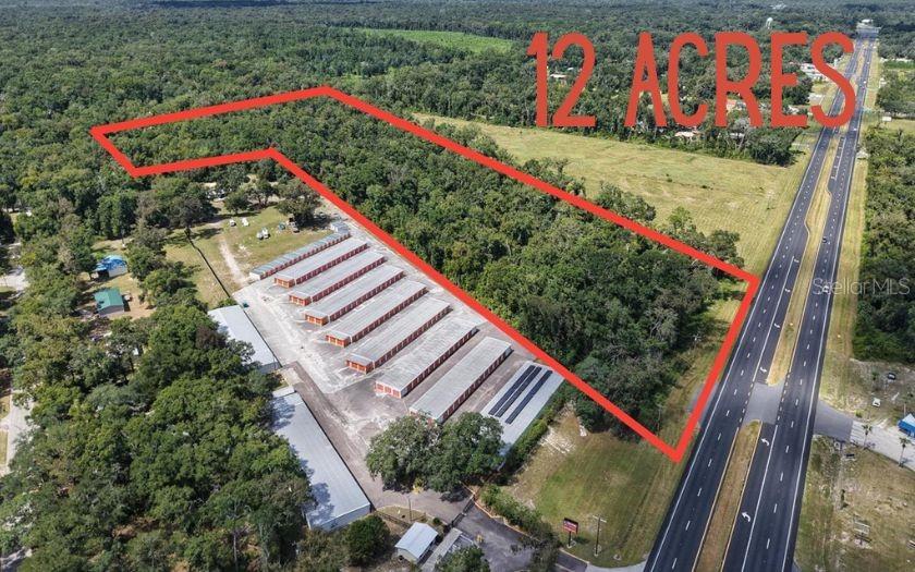 An aerial view shows a 12-acre plot of land containing a self-storage facility — NW US 19 HIGHWAY, FANNING SPRINGS, FL