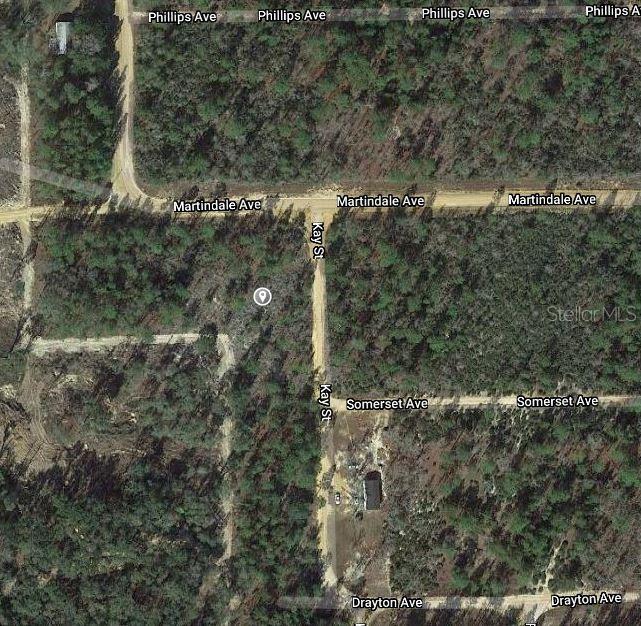 This is an aerial map view of a wooded area with dirt roads and intersections — 00 KAY STREET, INTERLACHEN, FL