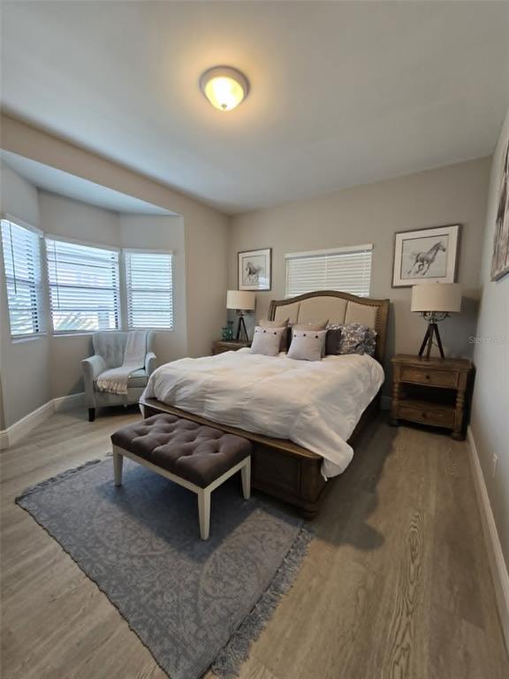 A kitchen features light gray cabinets, stainless steel appliances, and white quartz countertops — 244 LEXINGTON DRIVE, DAYTONA BEACH, FL