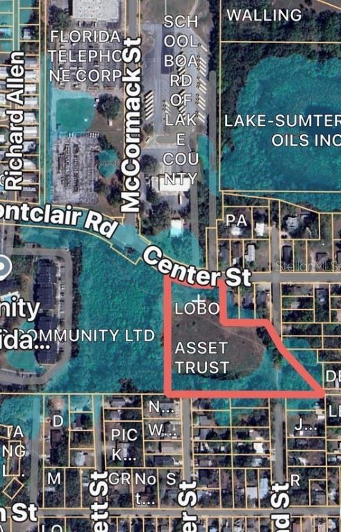 This is an aerial map showing a highlighted land parcel located near Center Street — N OAKLAND STREET, LEESBURG, FL