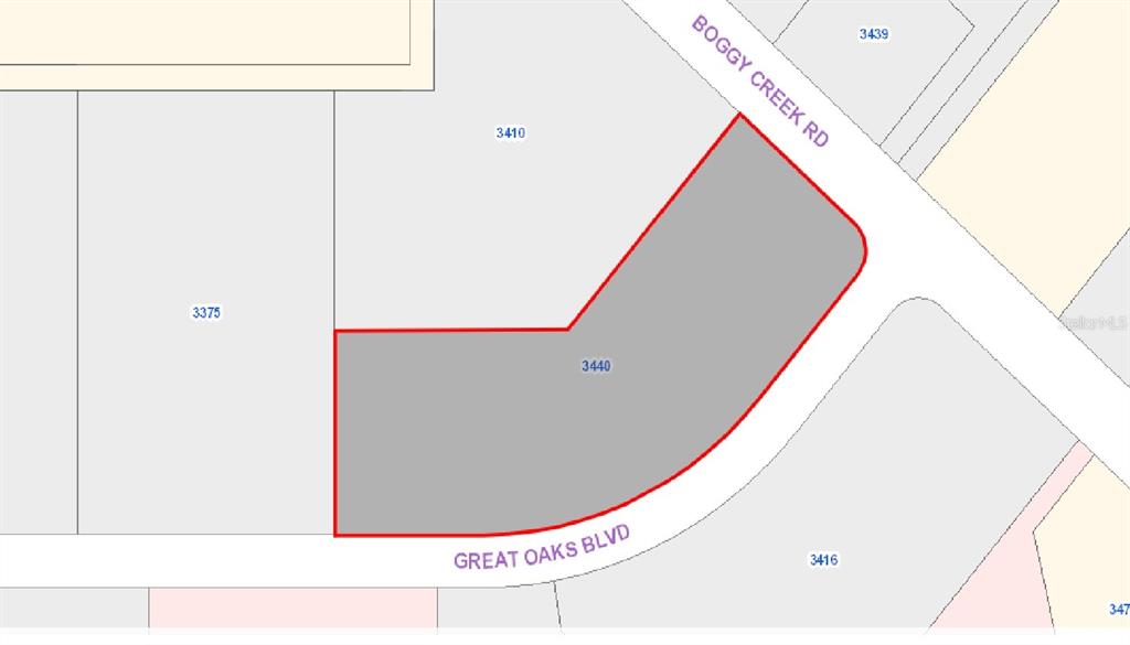 This is a map showing a property lot outlined in red at a street intersection — 3440 BOGGY CREEK ROAD, KISSIMMEE, FL