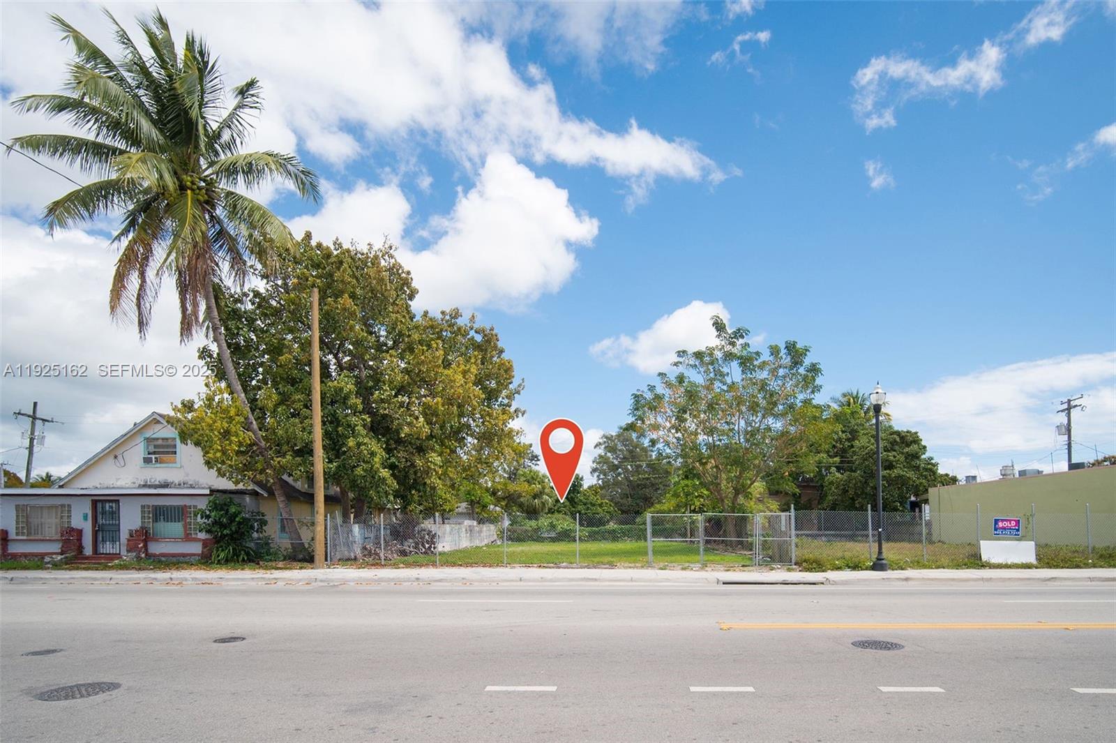 A street corner view shows a vacant lot with a location pin and nearby buildings — 7635 NE 2nd Ave, Miami FL 33138, MIAMI, FL