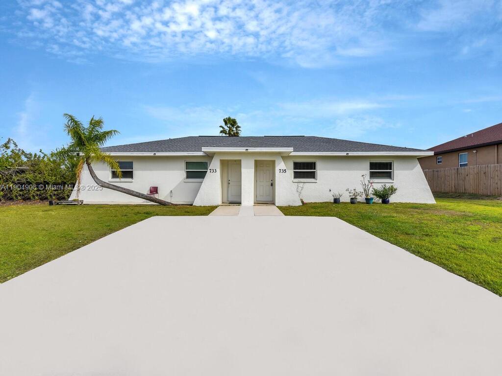 733/735 GILBERT AVE S, Lehigh Acres FL 33973