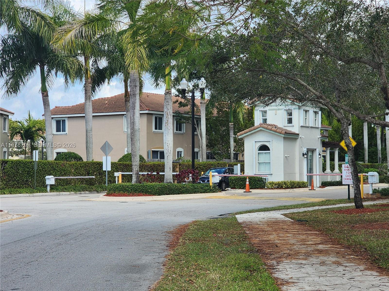 SECURITY AT THE ENTRANCE OF THE GATE, ENTRY OF THE PROPERTY. — HOMESTEAD, FL