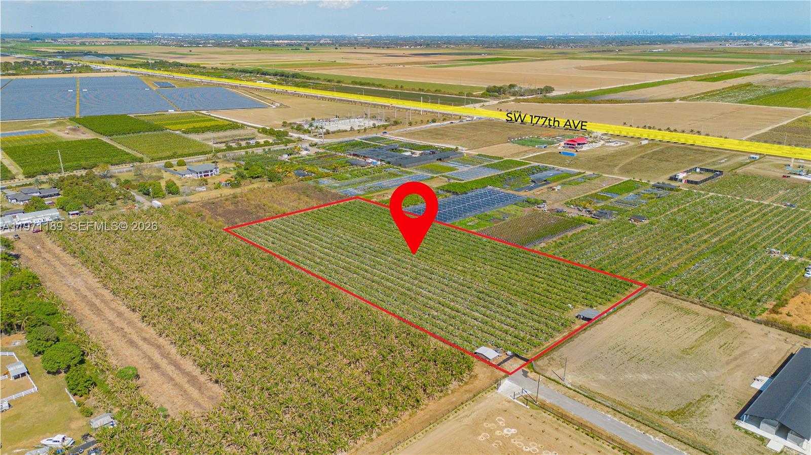 An aerial view shows a rectangular agricultural plot outlined in red near a road — 139XX sw 180TH AVE, Miami FL 33196, MIAMI, FL