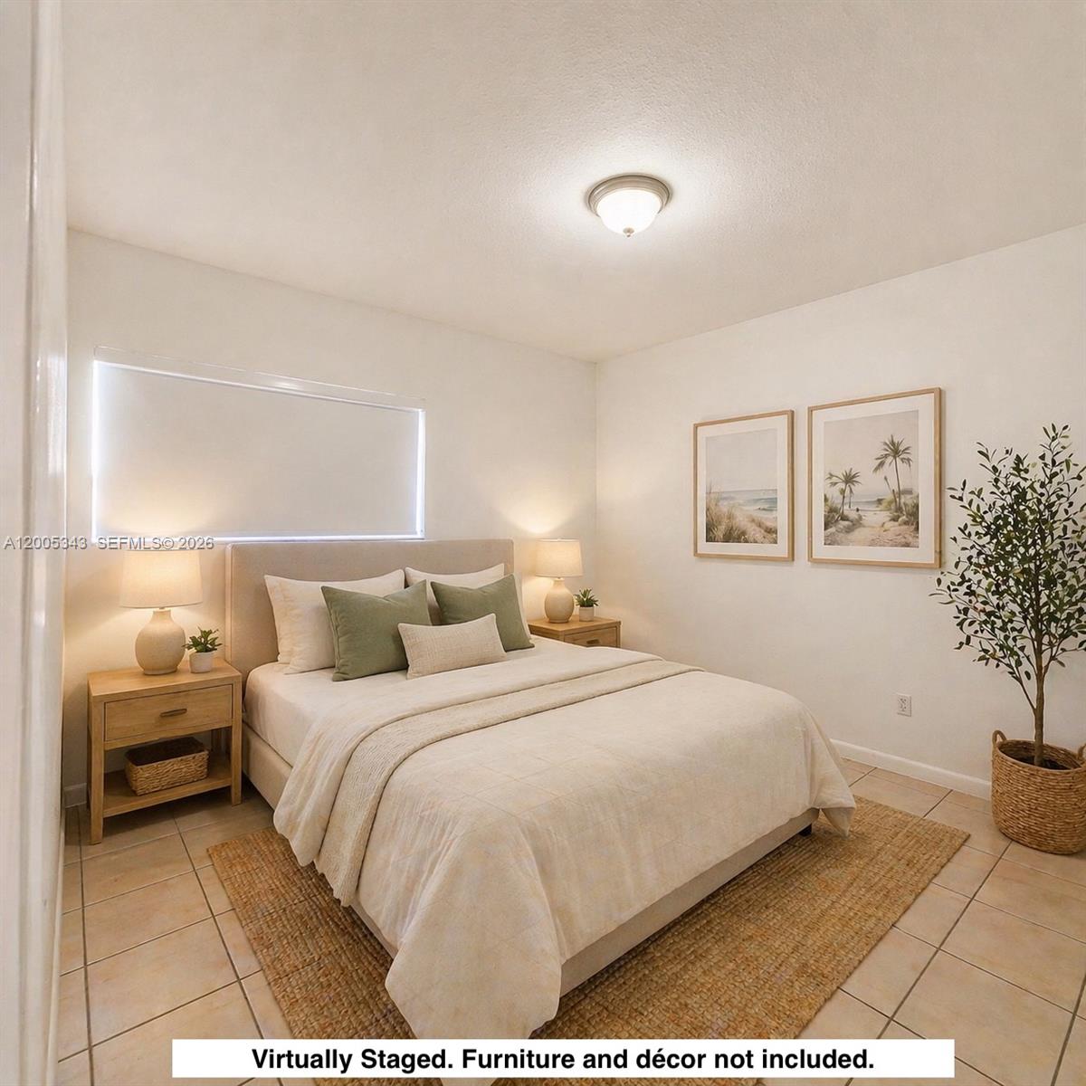 This bedroom features a bed with neutral bedding, two nightstands, and a potted plant — 1185 Marseille Dr # 209, Miami Beach FL 33141, MIAMI BEACH, FL