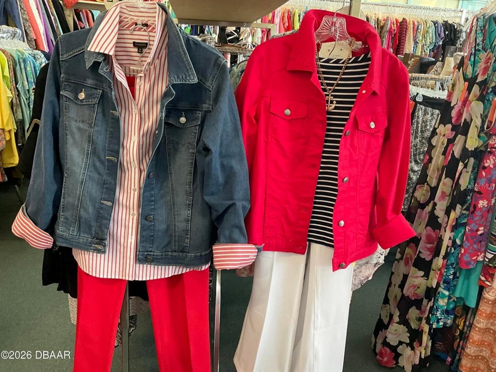 Two mannequins display casual outfits with jackets and pants in a clothing store — 0 CONFIDENTIAL, ORMOND BEACH, FL