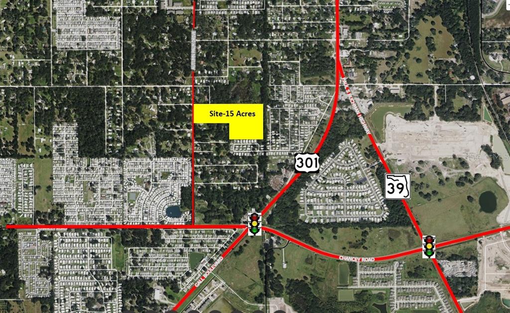 This aerial map shows a 15-acre property highlighted in yellow near major roads and intersections — 3902 AUTUMN PALM DRIVE, ZEPHYRHILLS, FL