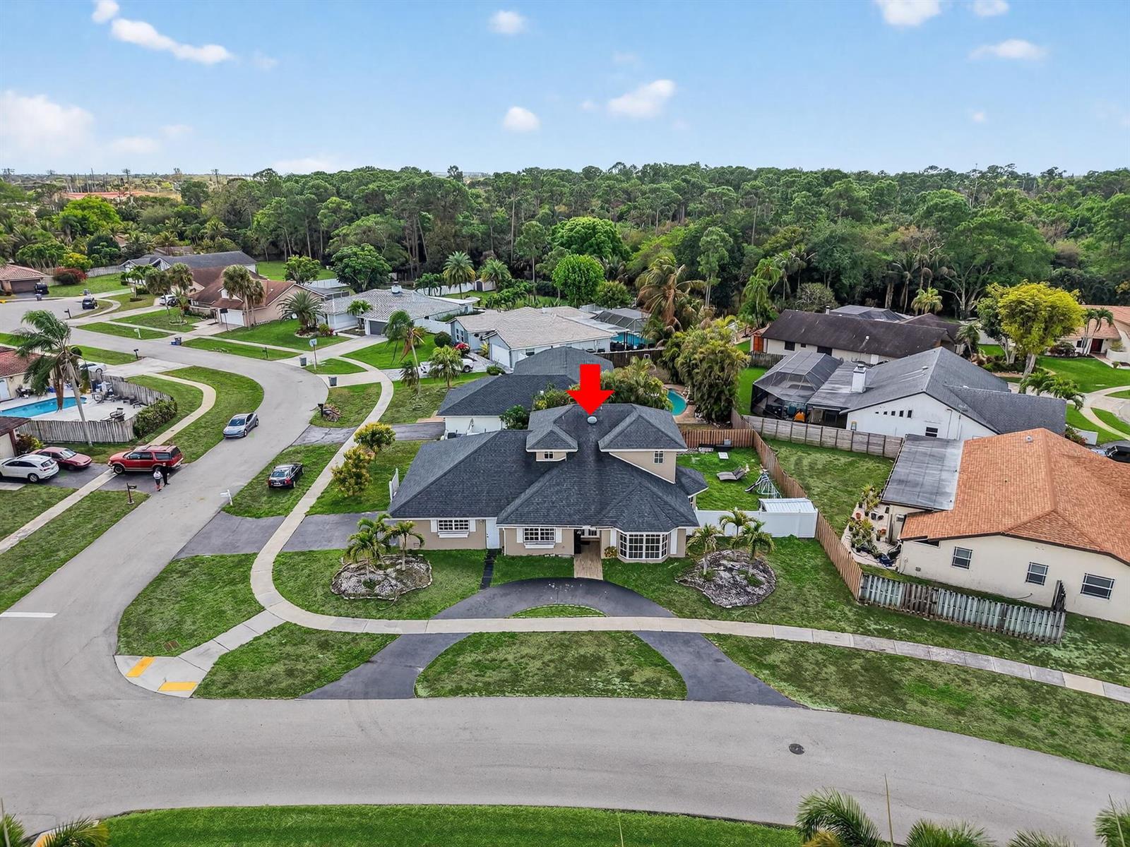 An aerial view shows a single-story suburban house with a dark shingled roof and driveway — 21724 Little Bear Way, Boca Raton FL 33428, BOCA RATON, FL