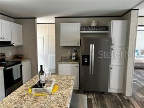 9494 SE 144TH PLACE, SUMMERFIELD, FL — photo 4 of 14