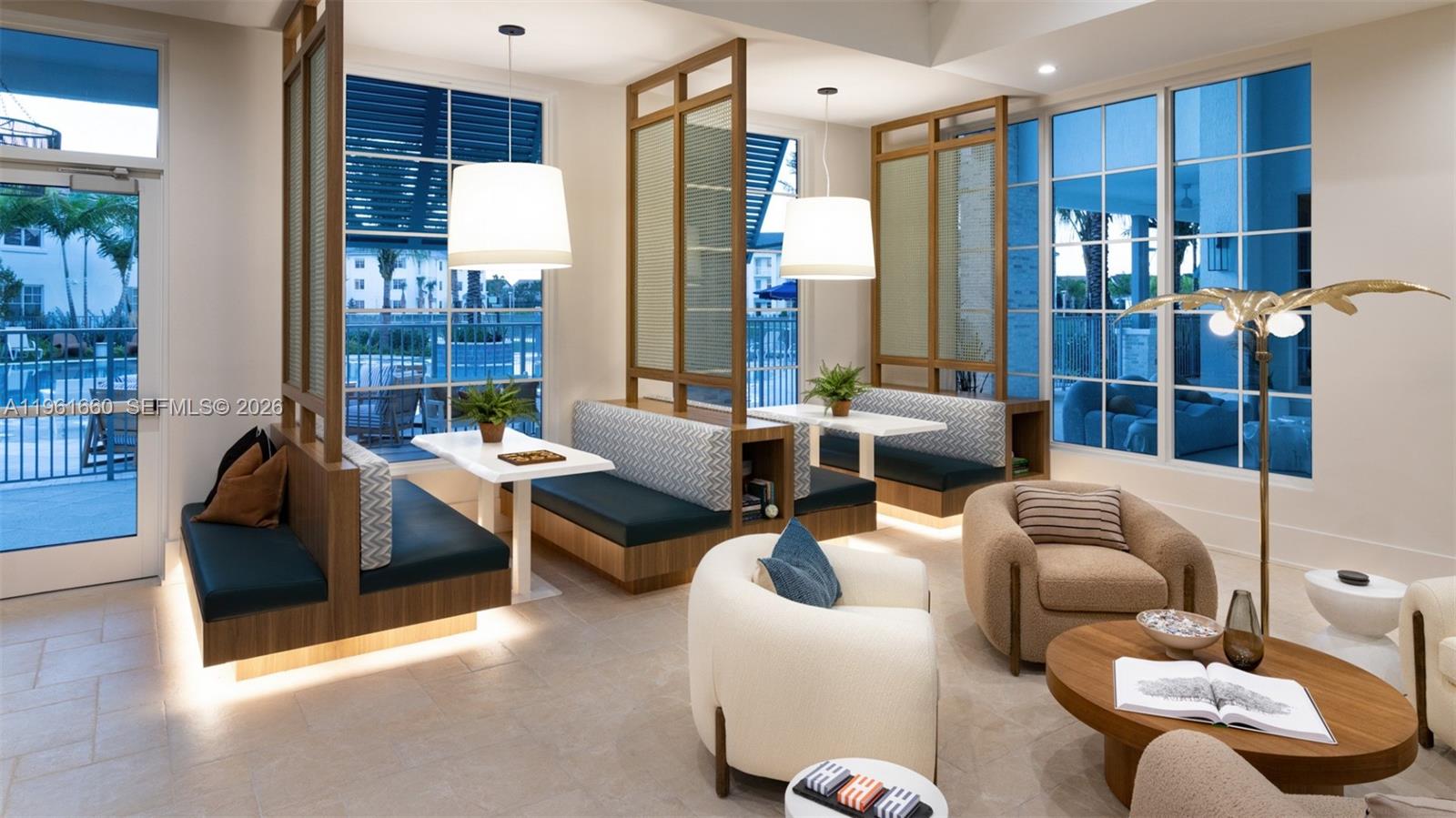 A modern lounge area features booth seating, pendant lights, and armchairs near large windows — 4310 Chukka Ln # A1, Lake Worth FL 33467, LAKE WORTH, FL