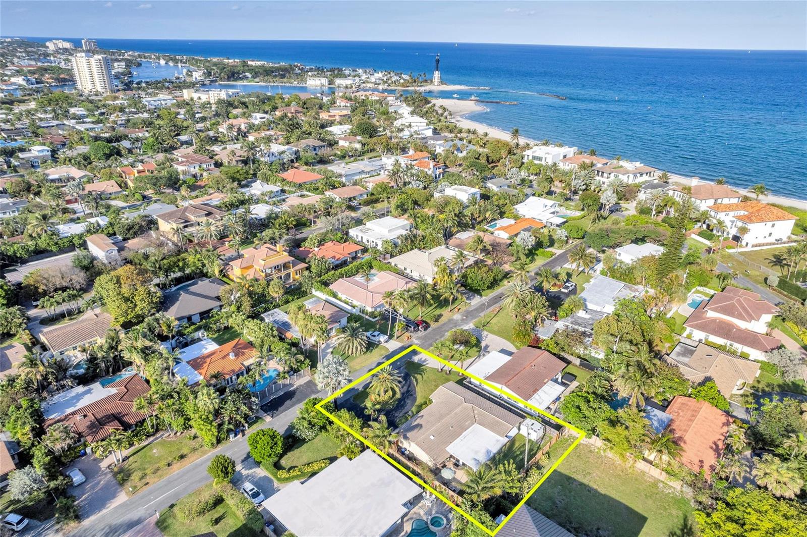 An aerial view shows a single-story house with a yellow outline in a coastal neighborhood — 3404 Barton Road, Pompano Beach FL 33062, POMPANO BEACH, FL