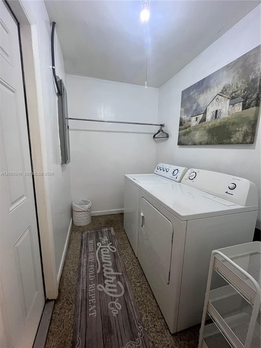 A bathroom features a vanity with a marble countertop, a toilet, and a tiled shower — 9840 SW 165th Ter, Miami FL 33157, MIAMI, FL