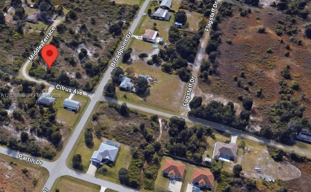 This is an aerial map view of a residential neighborhood with several houses and streets — 2075 NE MIDDLE TER, Punta Gorda FL 33983, PUNTA GORDA, FL