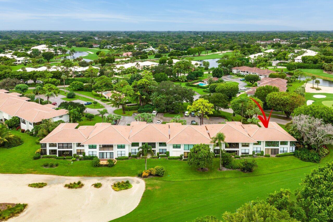 An aerial view of a multi-unit residential building with a tile roof on a golf course — 11312 Quail Covey Road, Boynton Beach FL 33436, BOYNTON BEACH, FL