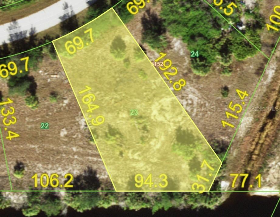 This is an aerial map showing the property boundaries and dimensions of a vacant lot — 7648 ST REGIS CIRCLE, PORT CHARLOTTE, FL