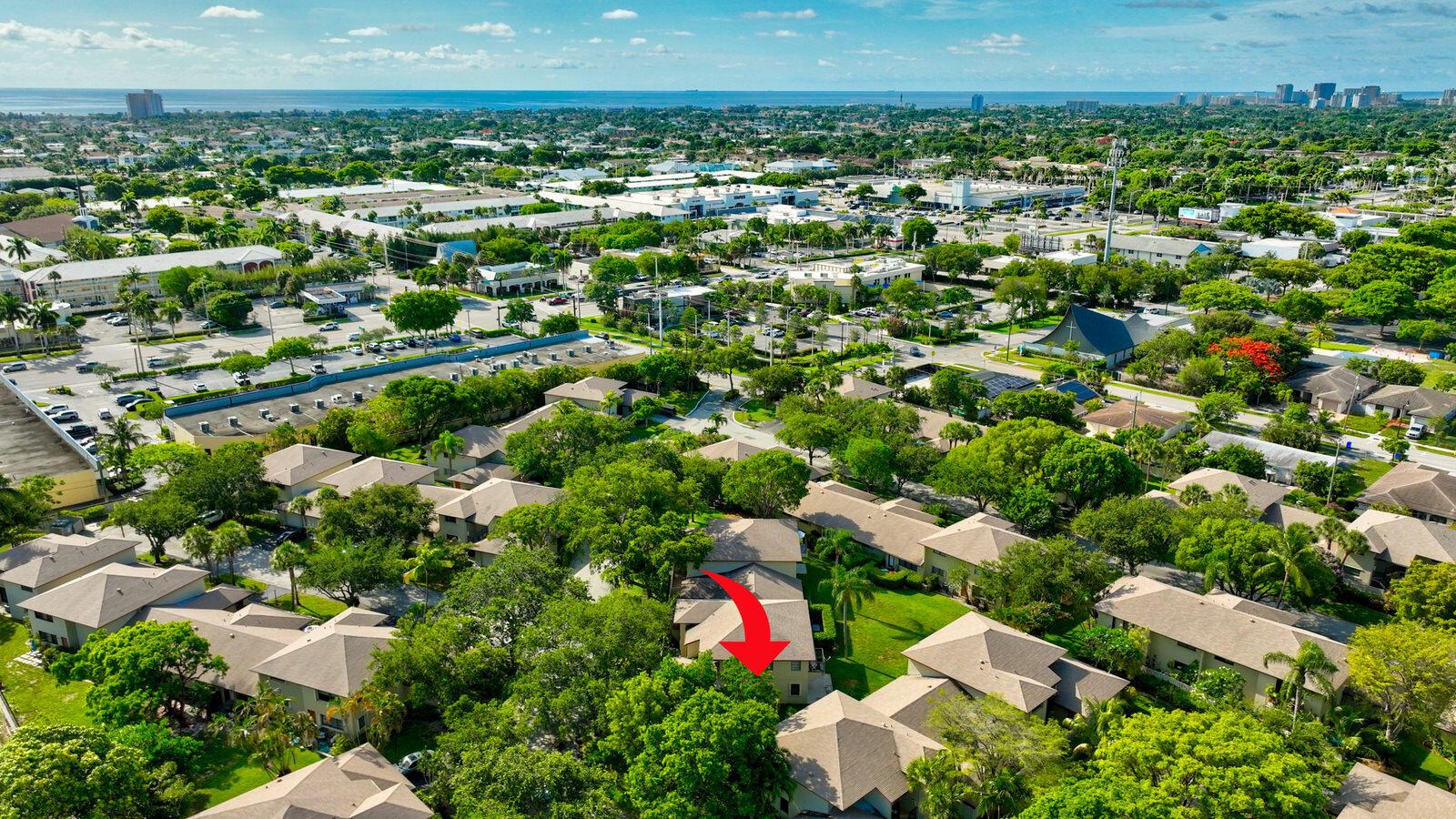 An aerial view of a residential complex with a red arrow pointing to a unit — 3951 NE 19th Road # 1701, Pompano Beach FL 33064, POMPANO BEACH, FL