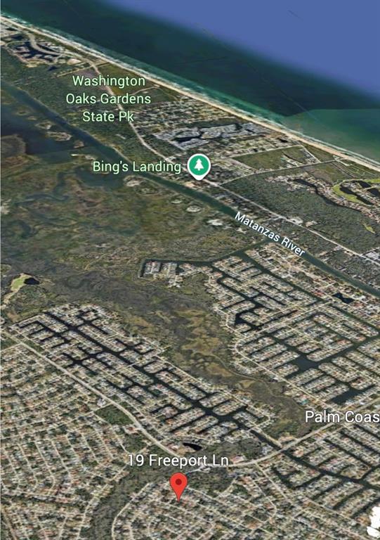 This is an aerial map view showing a residential neighborhood near the Matanzas River — 19 FREEPORT LANE, PALM COAST, FL