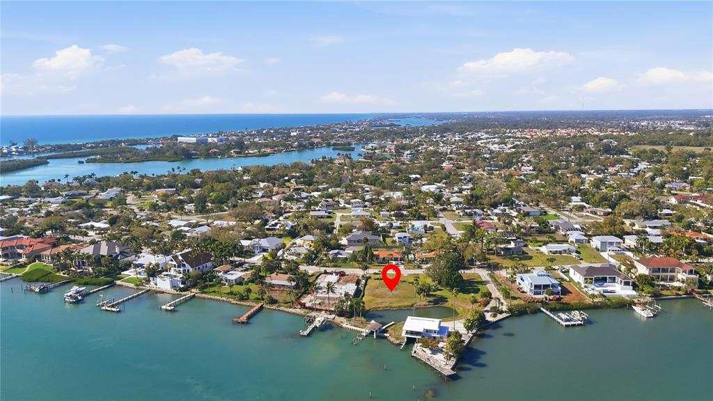 An aerial view shows a waterfront vacant lot marked with a red pin — 0 BAYVIEW PARKWAY, NOKOMIS, FL