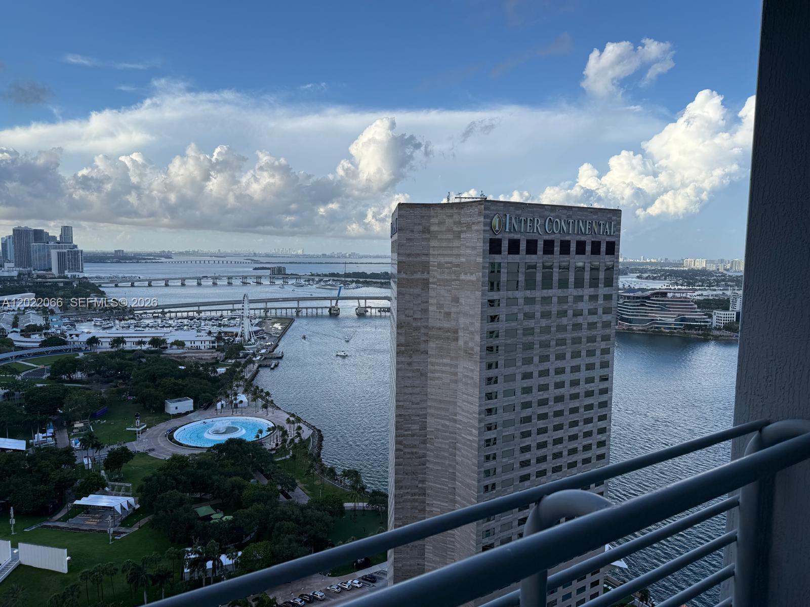 An elevated view shows the InterContinental hotel, a bay, bridges, and a park in Miami — 325 S Biscayne Blvd # 3620, Miami FL 33131, MIAMI, FL