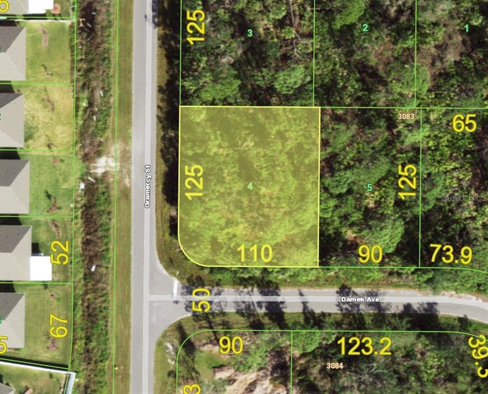 This is a map showing a vacant corner lot highlighted in yellow — 15278 DAMEK AVENUE, PORT CHARLOTTE, FL