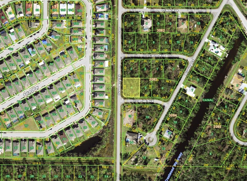 This is a satellite map showing residential lots, streets, and a canal — 15278 DAMEK AVENUE, PORT CHARLOTTE, FL