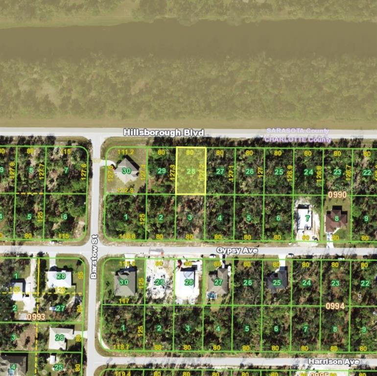 This is a map showing a highlighted vacant lot among other residential properties — 18351 HILLSBOROUGH BOULEVARD, PORT CHARLOTTE, FL
